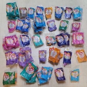 Unopened mini beanie babies